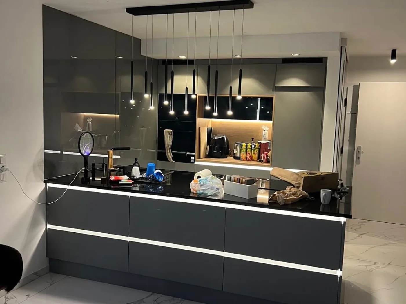 Kitchen island with light joint and pendant lamps